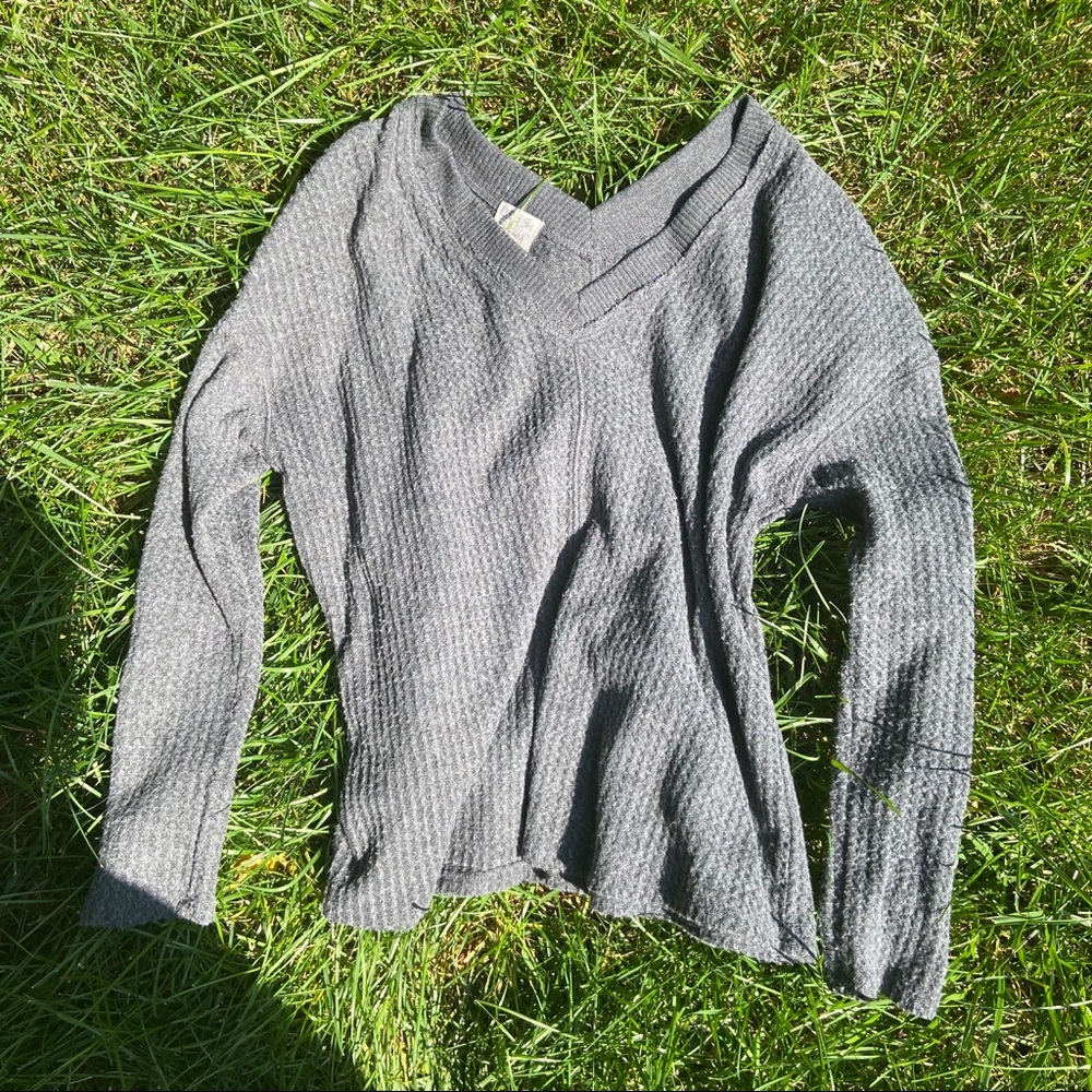 Soft grey sweater.